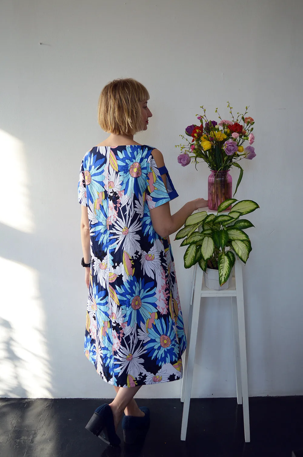 Colorful Linen Dress with Flower Pattern and Contrast Pockets and Naked Shoulder Detail.