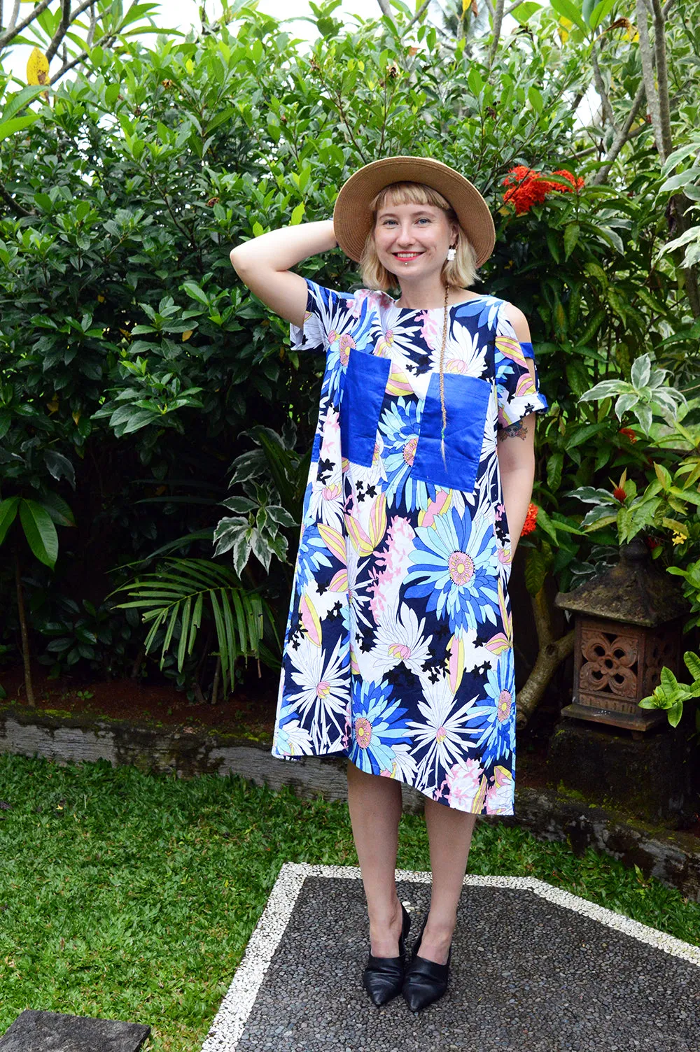 Colorful Linen Dress with Flower Pattern and Contrast Pockets and Naked Shoulder Detail.