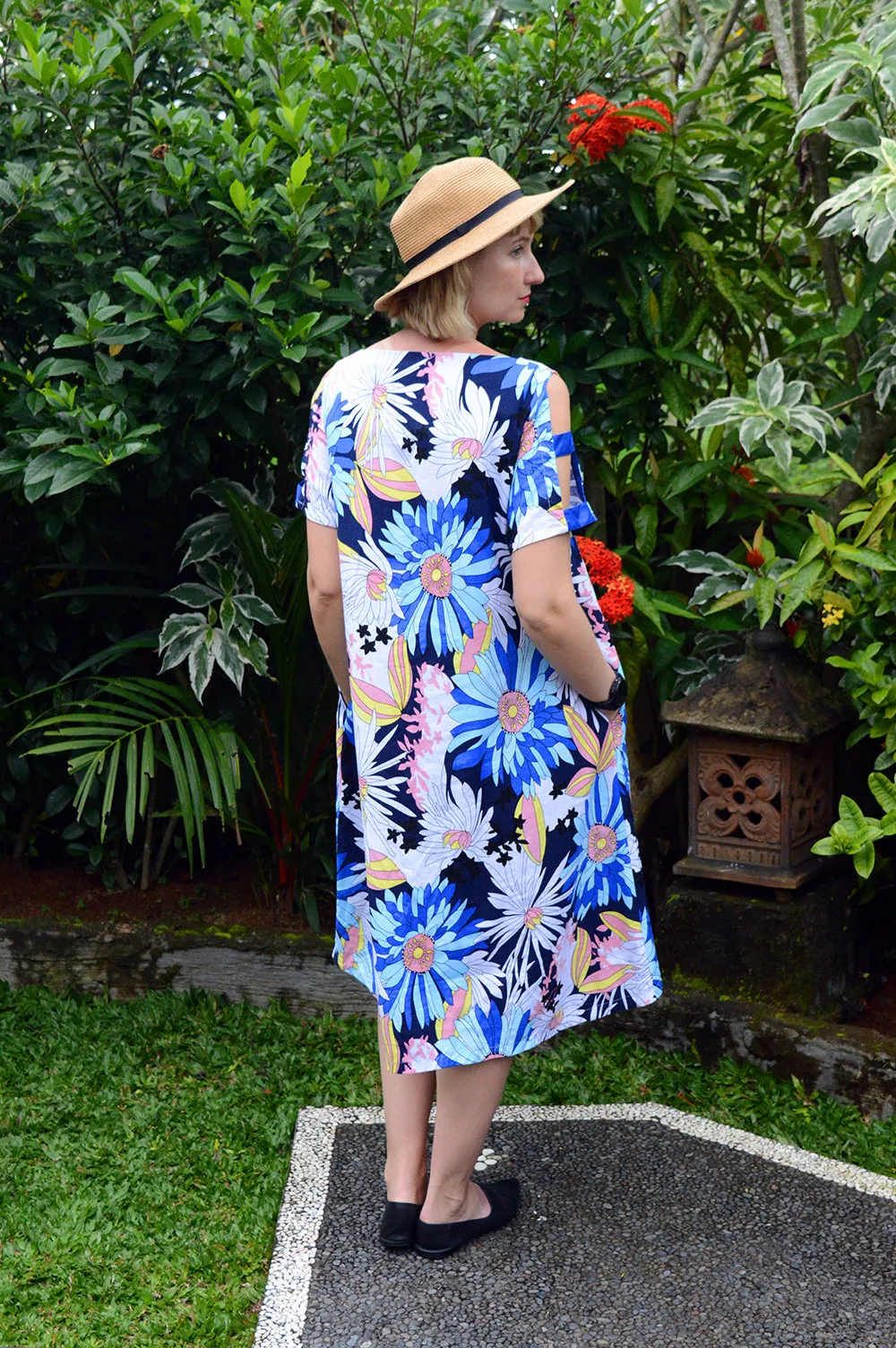 Colorful Linen Dress with Flower Pattern and Contrast Pockets and Naked Shoulder Detail.