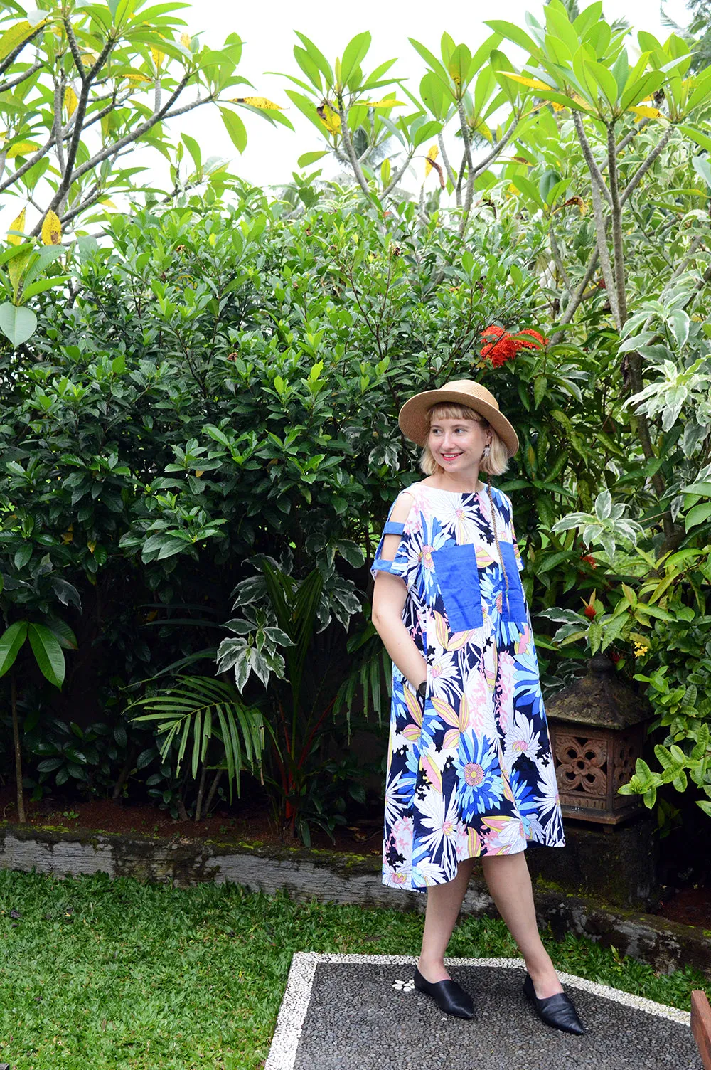 Colorful Linen Dress with Flower Pattern and Contrast Pockets and Naked Shoulder Detail.