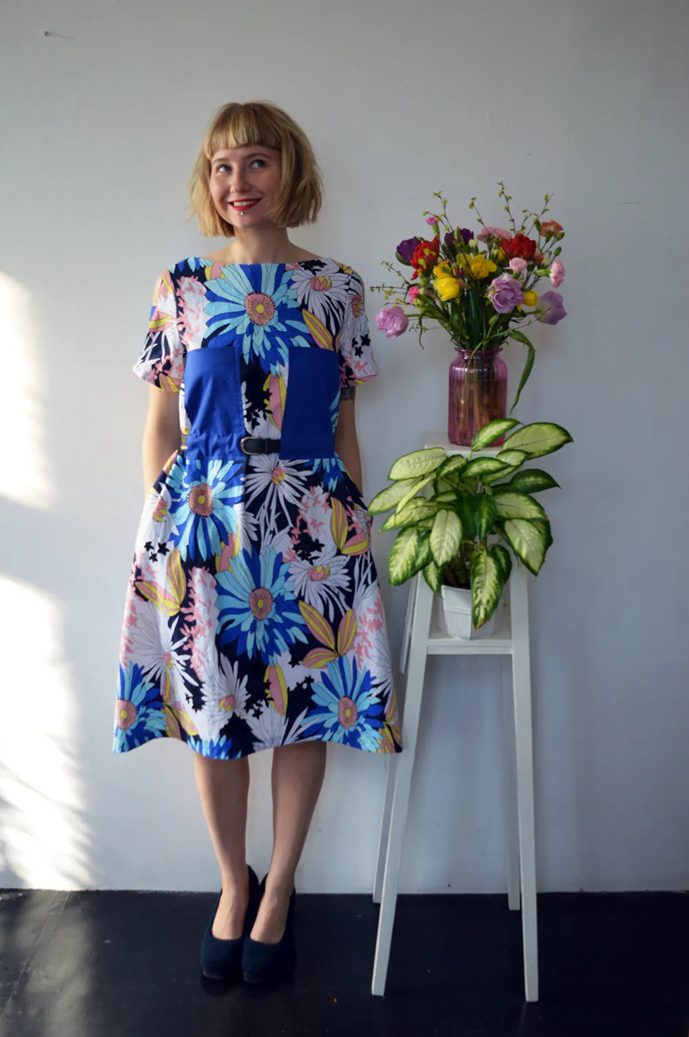 Colorful Linen Dress with Flower Pattern and Contrast Pockets and Naked Shoulder Detail.