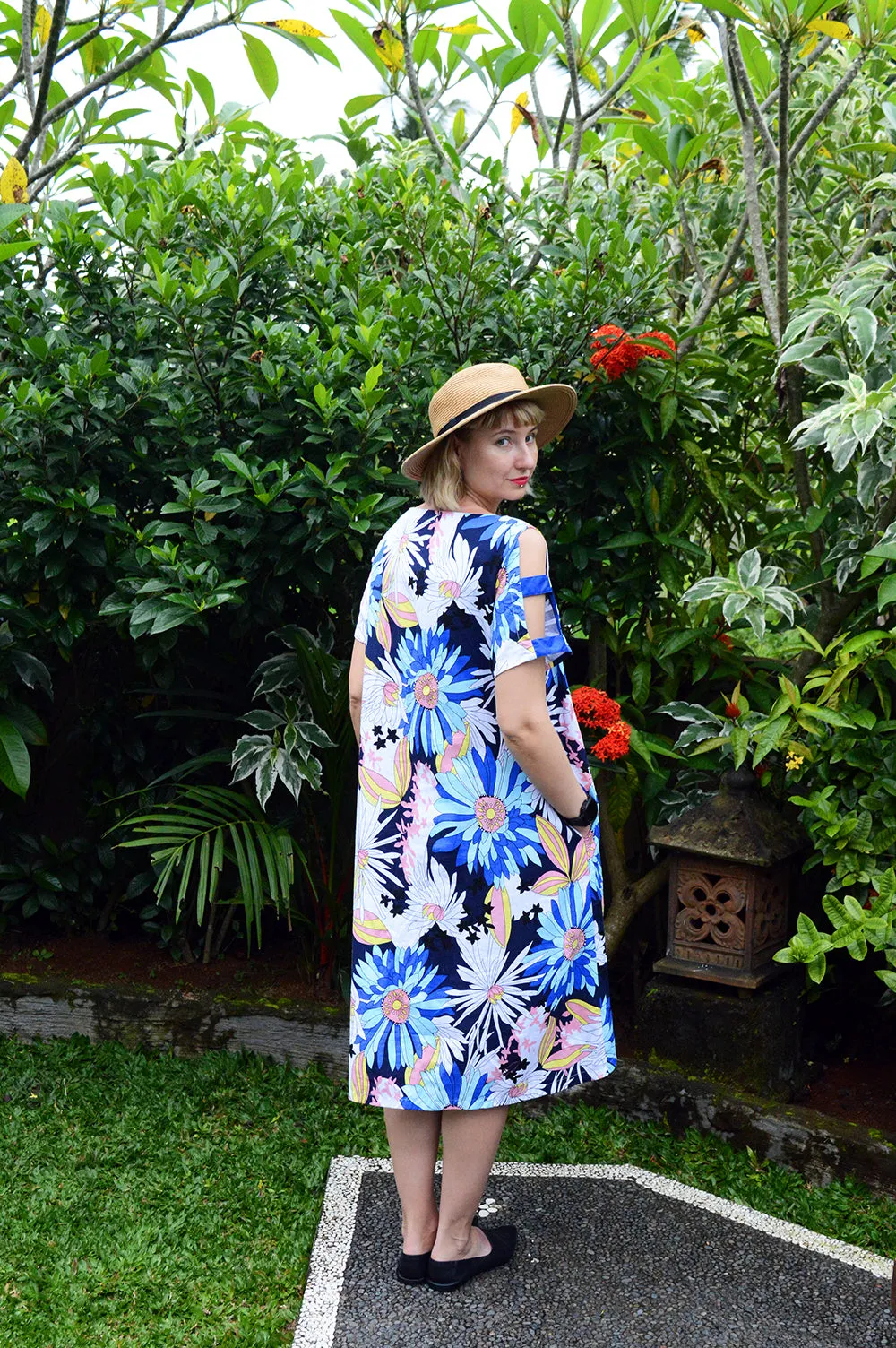 Colorful Linen Dress with Flower Pattern and Contrast Pockets and Naked Shoulder Detail.